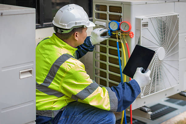 Professional Hvac technician working in Breinigsville, PA